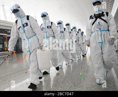 Wuhan, China. 03rd Apr, 2020. Firefighters prepare to conduct disinfection at the Wuhan Tianhe International Airport in Wuhan, central China's Hubei Province, April 3, 2020.  Wuhan, the Chinese city hardest hit by the novel coronavirus outbreak, conducted disinfection Friday on the local airport as operations will soon resume on April 8 when the city lifts its travel restrictions. Credit: Xinhua/Alamy Live News