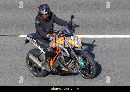 KTM Motorbike rider; two wheeled 