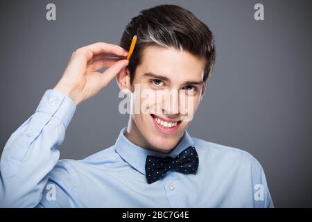 Young man smiling Stock Photo