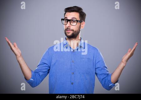 Young man gesturing Stock Photo