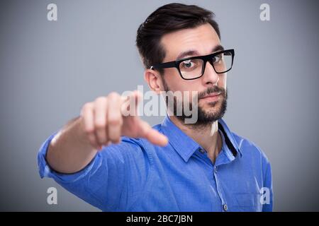 Young man gesturing Stock Photo