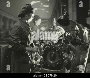 Women working in a factory during wartime, Italy 1941 Stock Photo