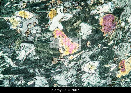 Feldspar rock under the microscope 100x Stock Photo - Alamy