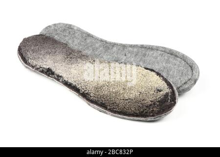 Winter fur insoles for shoes on white background. High resolution photo. Full depth of field. Stock Photo