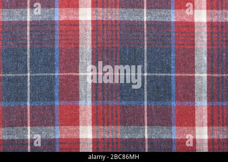 Red dark blue checkered shirt cloth background. High resolution photo. Full depth of field. Stock Photo
