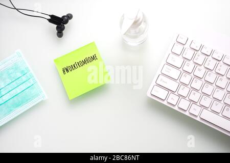 Work from home for quarantine times in Coronavirus Covid-19 pandemic outbreak background concept. Mockup sticky note on home office desk table during Stock Photo