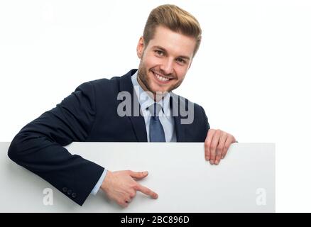 Business man holding white board Stock Photo