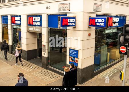 Metro Bank- modern British high street retail & commercial bank- exterior logo / signage- London Stock Photo