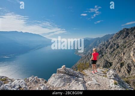 Pregasina, Riva del Garda, Trento Province, Trentino, Italy. Deep view from Punta Larici to Lake Garda with the town Limone sul Garda Stock Photo