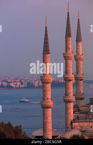 Istanbul, Turkey.  Minarets of the Blue Mosque.  Sultan Ahmet Camii. Bosphorus behind. Stock Photo