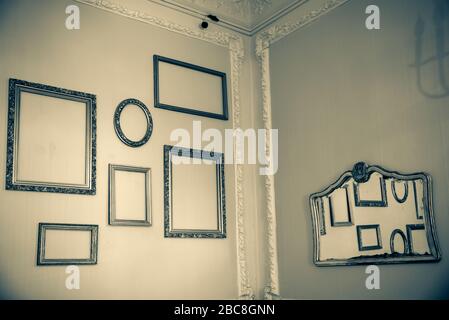 an empty room with empty art frames Stock Photo