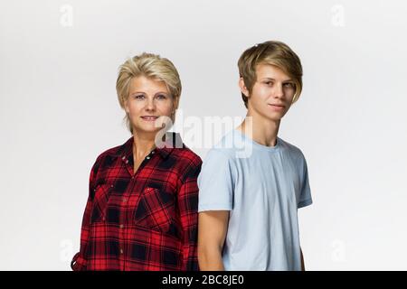 Family portrait. Smiling mother and son wearing casual clothing Stock Photo