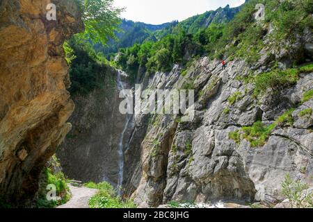 Long distance hiking trail E5 from Oberstdorf to Meran: Simmswasserfall with adventure via ferrata, Roßgumpenbach near Holzgau, Lechtal, Tyrol, Austri Stock Photo