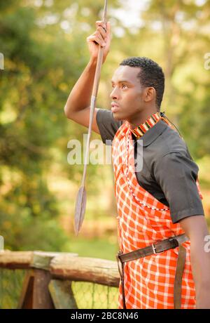 A man holding a spear Stock Photo