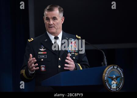 U.S. director of operations and plans at Army Headquarters, Lt. Gen. Charles Flynn, briefs reporters on the COVID-19 pandemic at the Pentagon March 26, 2020 in Arlington, Virginia. Stock Photo