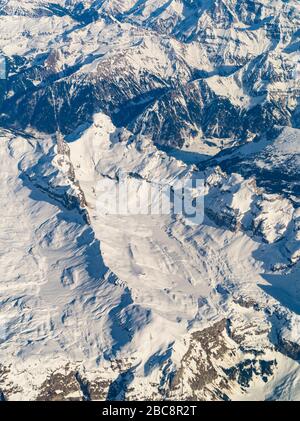 Aerial View of snow clad Swiss Alps from plane Stock Photo - Alamy