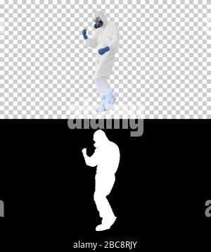 Doctor in hazard clothes making several win gestures, Alpha Chan Stock Photo