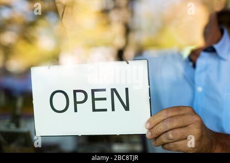 Man working in wine shop Stock Photo