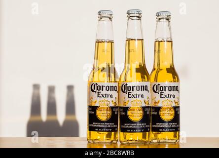Corona Extra beer bottles. Production has stopped due to the Coronavirus pandemic. Stock Photo