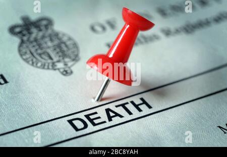 UK DEATH CERTIFICATE WITH RED BOARD PIN RE DYING CORONER CORONAVIRUS COVID-19 ILL HEALTH CARE HOSPITALS ETC UK Stock Photo