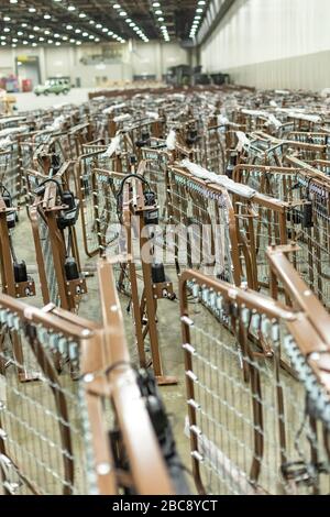 Detroit, Michigan, USA. 2nd Apr, 2020. Bed frames are waiting as workers construct an emergency field hospital at the TCF convention center. The 1,000-bed hospital will care for Covid-19 patients. Credit: Jim West/Alamy Live News Stock Photo