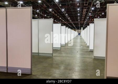 Detroit, Michigan, USA. 2nd Apr, 2020. Workers construct an emergency field hospital at the TCF convention center. The 1,000-bed hospital will care for Covid-19 patients. Credit: Jim West/Alamy Live News Stock Photo