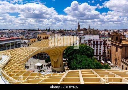 Sevilla, Andalusia, Spain  - 14 May 2013: View at the Cathedral of Sevilla with Giralda from Metropol Parasol. Stock Photo