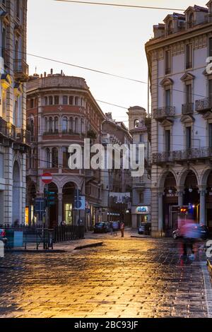 View of architecture and trail lights in Piazza Castello at dusk, Turin, Piedmont, Italy, Europe Stock Photo
