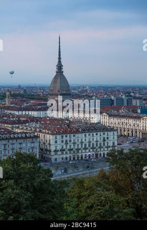 View of Turin and Mole Antonelliana from Santa Maria del Monte dei Cappuccini at dusk, Turin, Piedmont, Italy, Europe Stock Photo