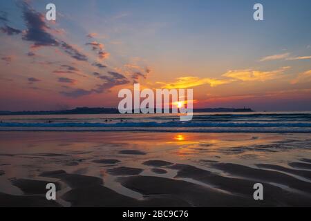 Peaceful sunset in the sand dunes of Loredo beach. Cantabria, Spain Stock Photo