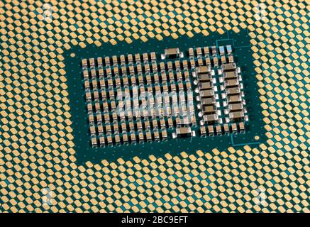 Macro photo of the center of the CPU chip ready for insertion into a modern personal computer motherboard Stock Photo
