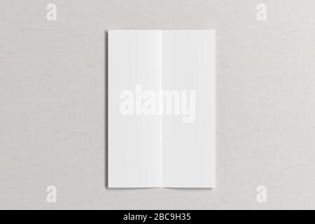 Blank vertical A4 leaflet on white wooden background. Bi-fold or half-fold opened brochure isolated with clipping path. View directly above. 3d illust Stock Photo