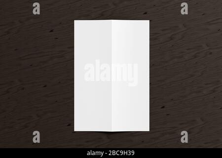Blank vertical A4 leaflet cover on black wooden background. Bi-fold or half-fold opened brochure isolated with clipping path. View directly above. 3d Stock Photo