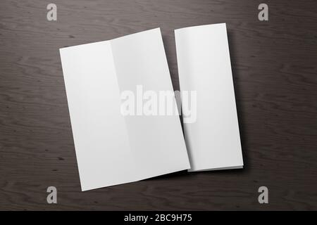 Blank vertical A4 leaflet on black wooden background. Bi-fold or half-fold opened and folded brochure isolated with clipping path. Side view. 3d illus Stock Photo