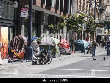 San Francisco, United States. 03rd Apr, 2020. Tents and homeless occupy the sidewalk on Eddy Street in the Tenderloin district of San Francisco on Friday, April 3, 2020. San Francisco is trying to spread out their homeless to avoid the coronavirus. Photo by Terry Schmitt/UPI Credit: UPI/Alamy Live News Stock Photo