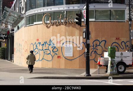 Vancouver, Canada - Apr 2, 2020: Vancouver shops have boarded up their storefronts with wood following an increase in break-and-enters due to COVID-19 Stock Photo