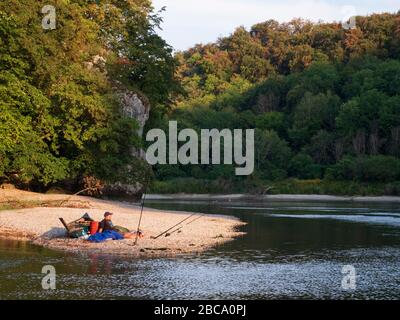 Angler with canoe at the Danube breakthrough at Weltenburg, Danube, Bavaria, Germany Stock Photo