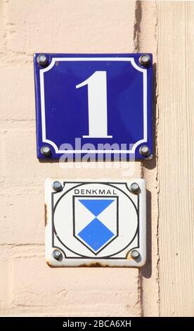 Blue house number plate No. 1 with monument sign, Schelfstadt, Mecklenburg-West Pomerania, Germany, Europe Stock Photo