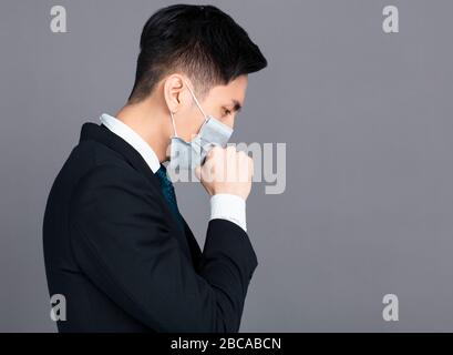 young man wear medical mask and cough Stock Photo