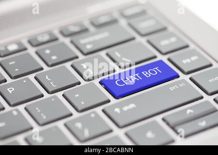 Automated smart chat bot messenger assistant to business support calls concept shown on close up enter key on notebook keyboard Stock Photo