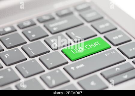 Automated smart chat bot messenger assistant to business support calls concept shown on close up enter key on notebook keyboard Stock Photo