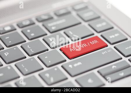 VR virtual reality AR augmented reality MR mixed reality concept shown on close up enter key on notebook keyboard Stock Photo