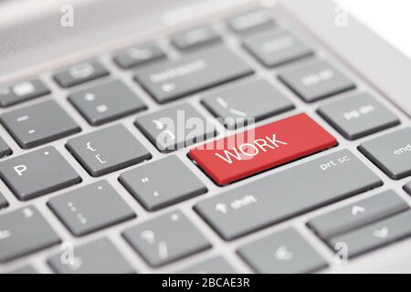 Work from home concept shown on close up enter key on notebook keyboard Stock Photo