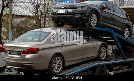 Bucharest Romania March 02 A Bmw 5d Car And A Volkswagen Passat B8 Highline Variant Are Transported On A Trailer In Bucharest Stock Photo Alamy