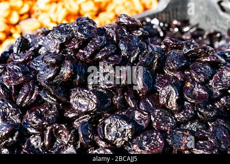 Prunes Macro. texture dry prunes closeup, food background. Stock Photo