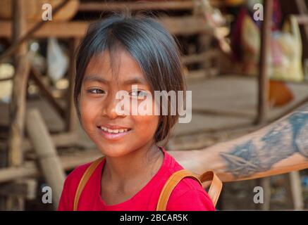 Closeup portrait of young Cambodian girl smiling Stock Photo