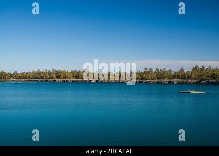 Sweden, Gotland Island, Labro, Bla Lagunen, Blue Lagoon, natural swimming area in former chalk quarry with blue green water Stock Photo