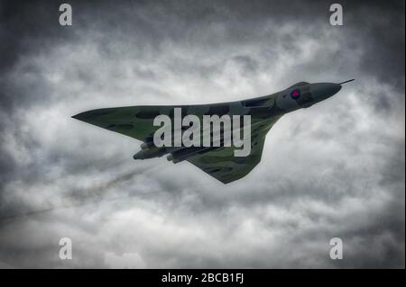 RAF AVRO Vulcan Bomber seen against a dark sky at RAF Leuchars airshow 2011 Stock Photo