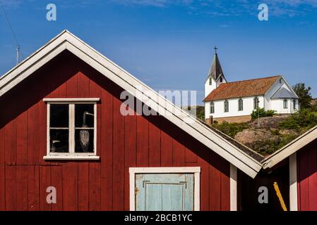 Sweden, Bohuslan, Hamburgsund, red fishing shacks Stock Photo