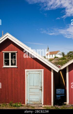 Sweden, Bohuslan, Hamburgsund, red fishing shacks Stock Photo